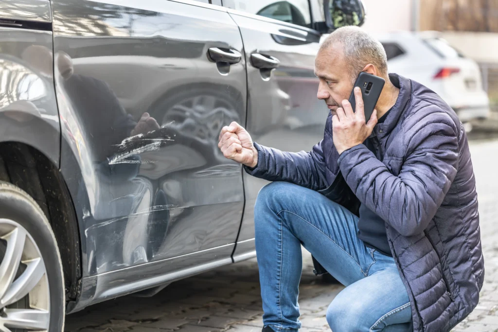 angry driver calls insurance company police because damaged car